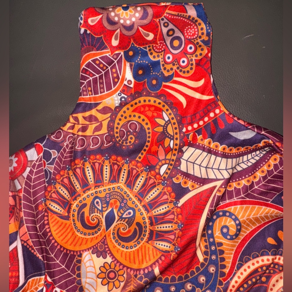 Laid-back luxury with a Boho twist. Add this turtleneck to your lineup